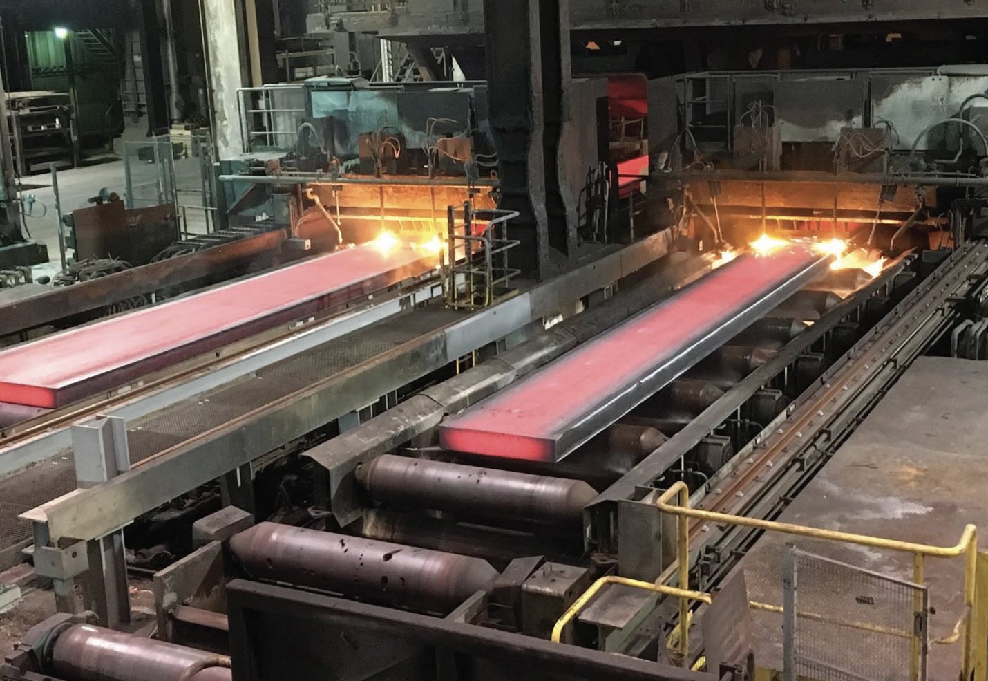 An oxide layer is already forming on red-hot steel.